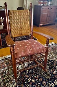 Antique Cane Back Rocking Chair With Upholstered Seat