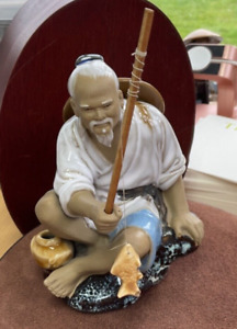 Chinese Mudman Shiwan Figurine Fisherman With 1 Rod And Fish Sitting 6in Tall