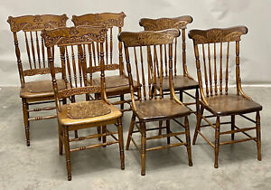 An Assembled Set Of Six Oak Back Pressed Chairs 