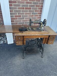 New Home Cast Iron Antique Sewing Machine In Original Cabinet