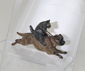 A Cold Painted Viennese Bronze Miniature Pug With A Cat Riding On His Back