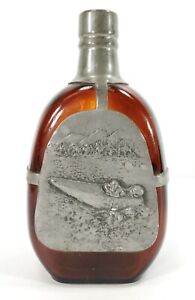 Vintage Or Antique Liquor Bottle With Racing Motorboat Relief In Pewter