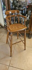 Antique Oak Bow Back Cane Seat Child S Booster Chair With Arms New England Dolls