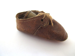 Antique Tiny Leather Shoe Holding A Brass Sewing Thimble