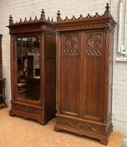 Matched Pair Of Antique Gothic Revival French Armoires In Walnut