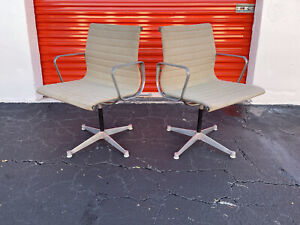 Iconic Pair Of Charles Eames Ea 107 Aluminum Group Armchairs