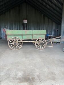 Antique Farm Grain Wagon With Wooden Wheels And Hubs