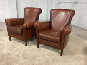 Pair Of Antique Sheep Leather Club Chairs